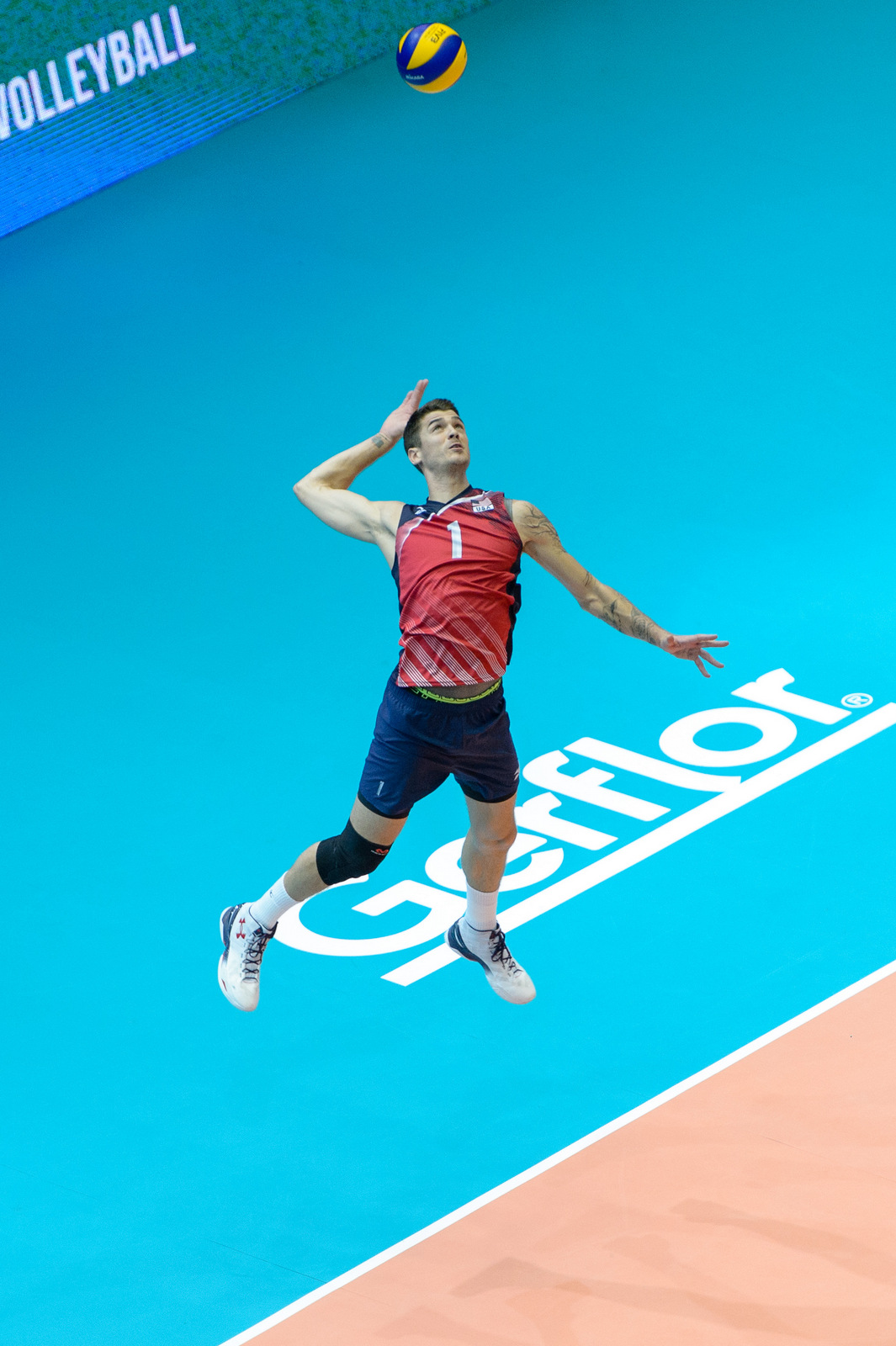 USA's Matthew Anderson (1) serves during a FIVB Men's Volleyball World League match between the USA and Bulgaria in Dallas, Texas.