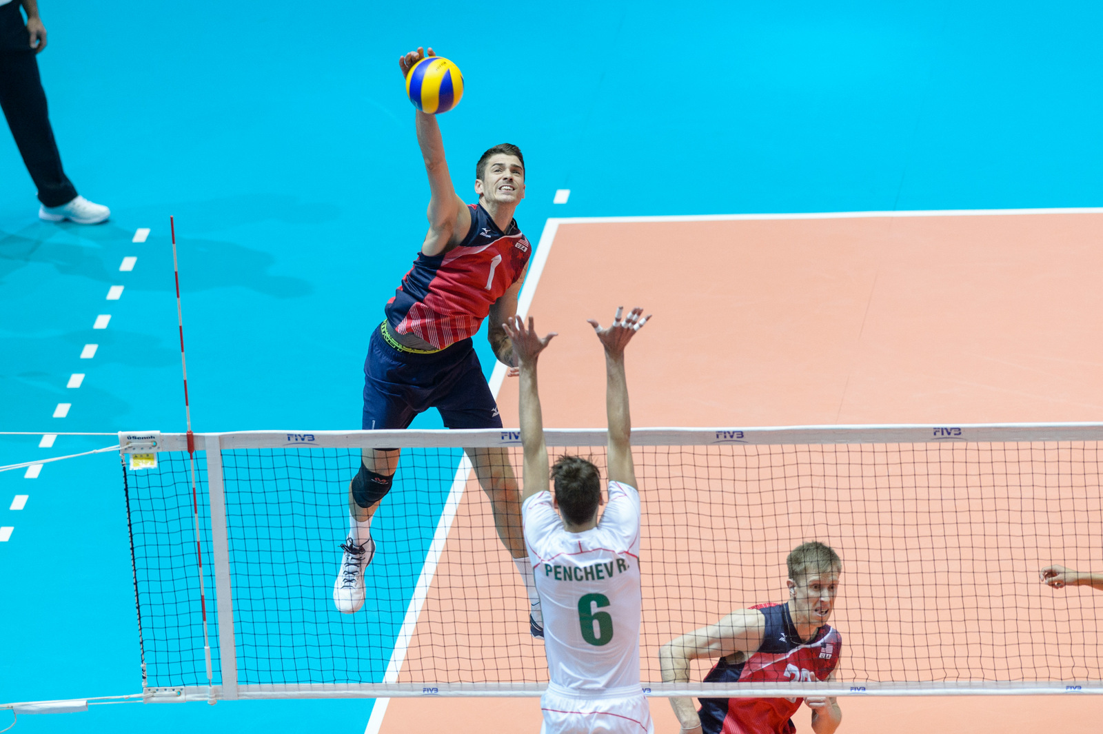 USA's Matthew Anderson (1) spikes during a FIVB Men's Volleyball World League match between the USA and Bulgaria in Dallas, Texas.