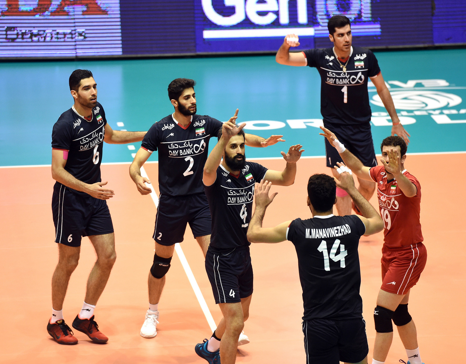 Iran team celebrate during the match against Bulgaria