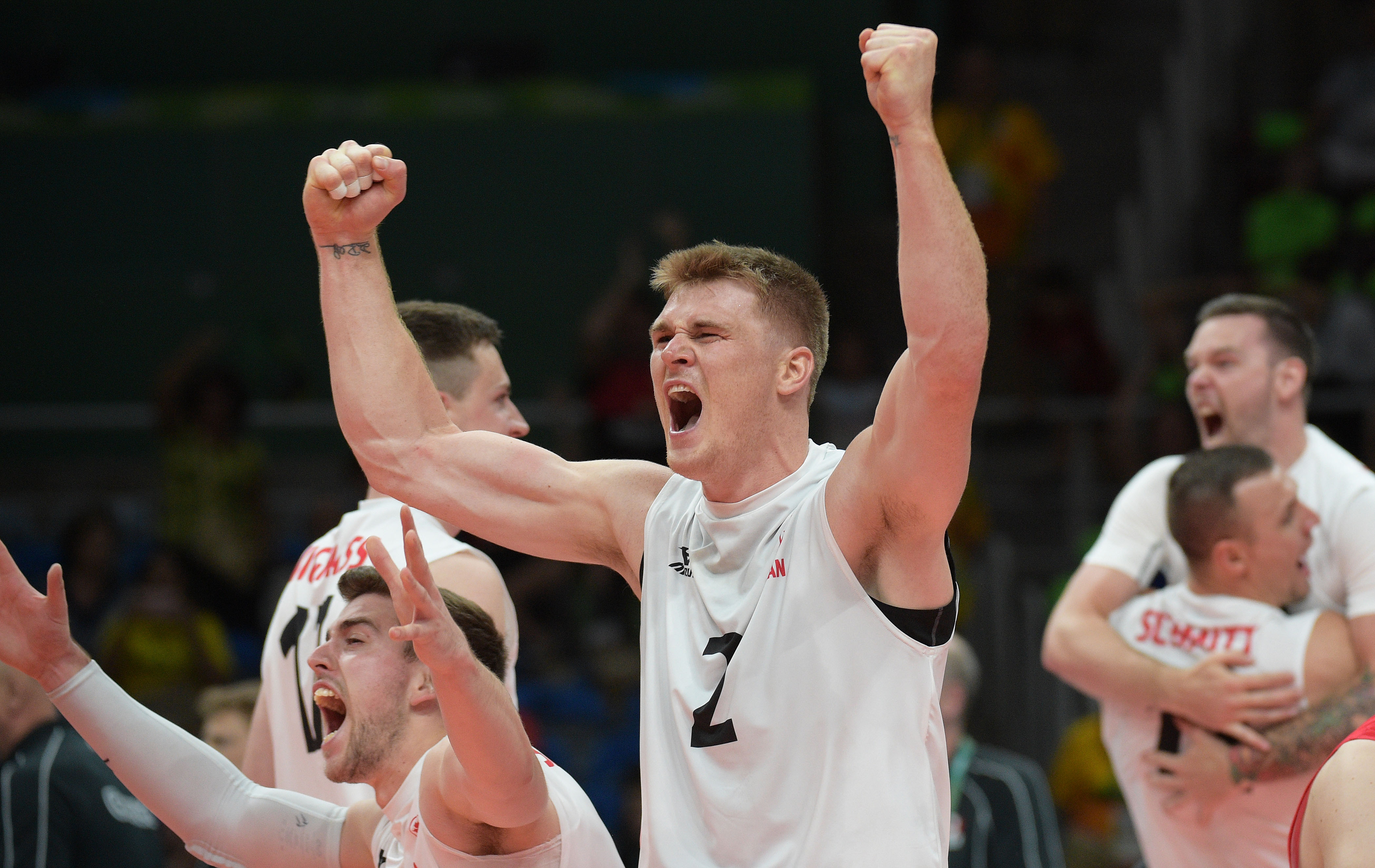 CanadianplayerscelebrateafterwinningthematchagainsttheUnitedStates