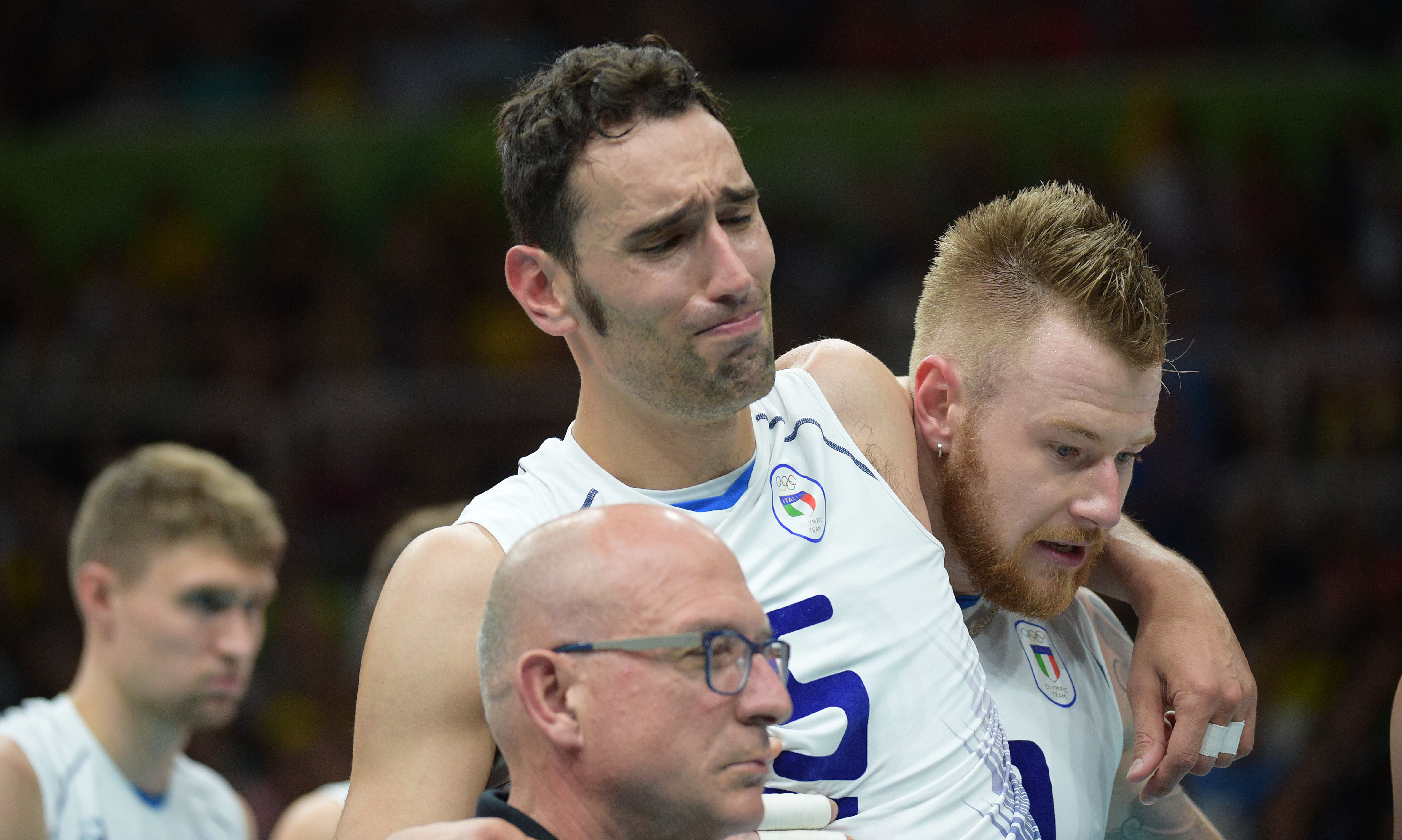 EmanueleBirarelliofItalyiscarriedaftersufferinganinjury