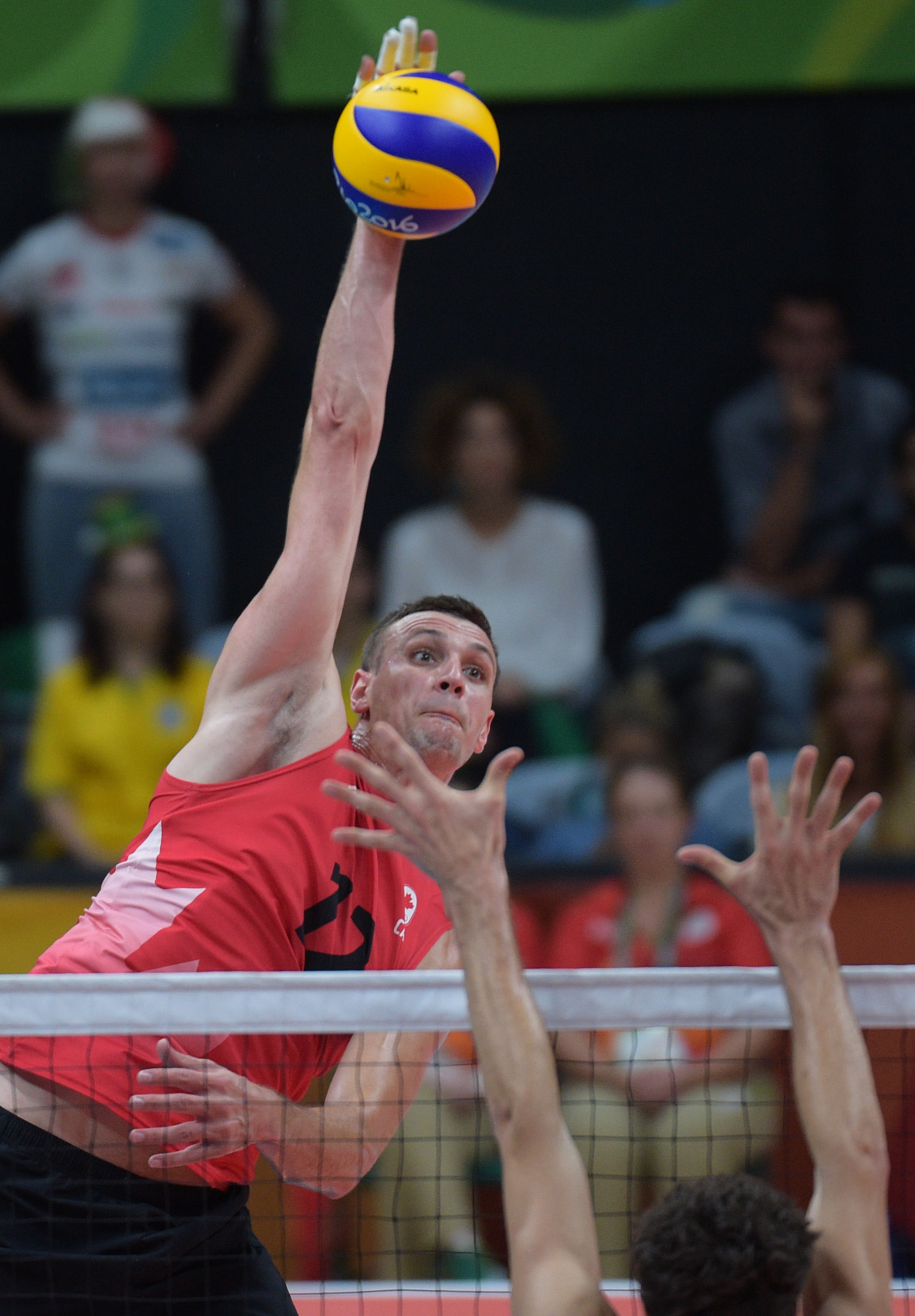 GavinSchmittofCanadaspikesoverItalianblock