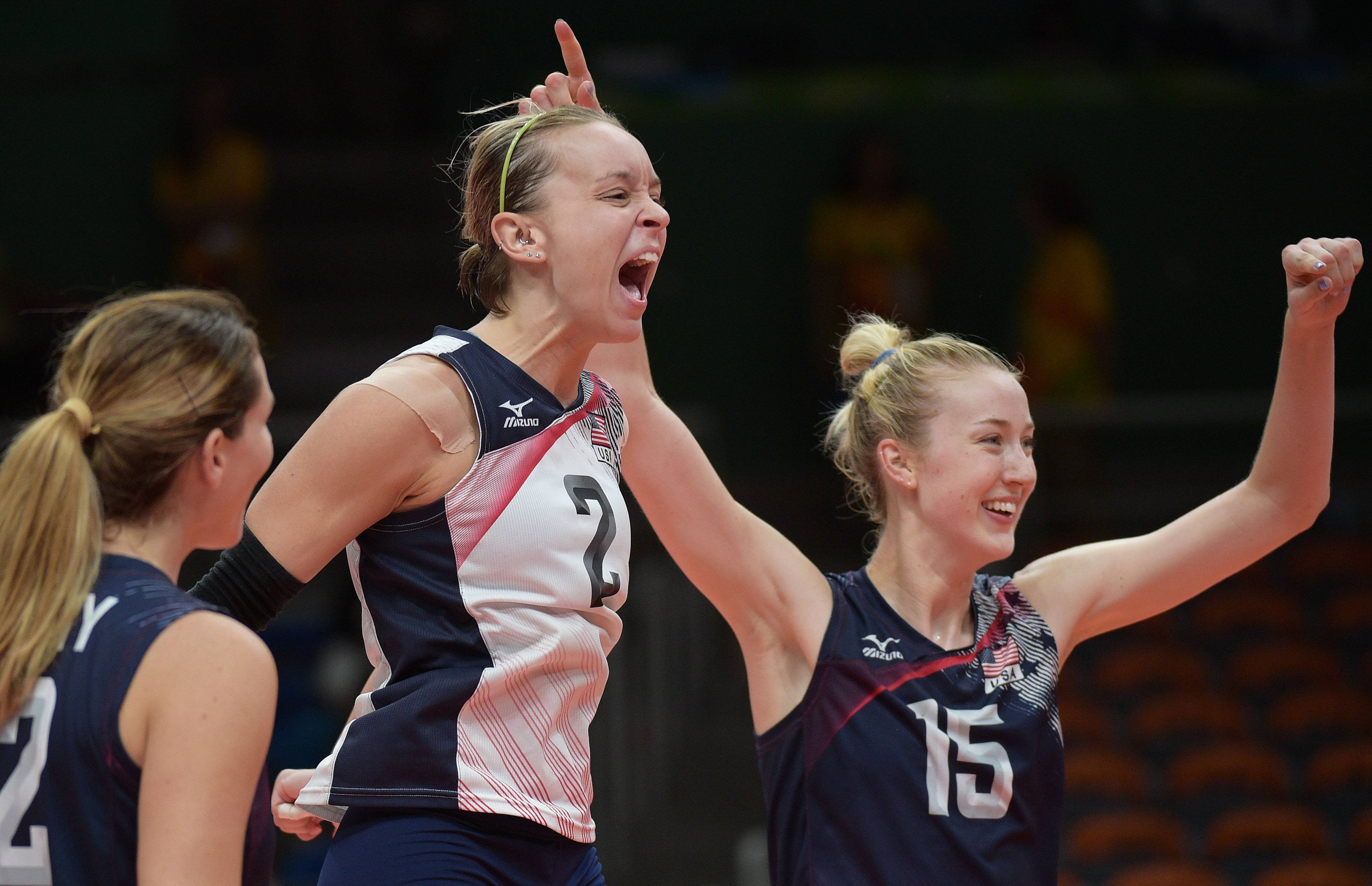 LiberoKaylaBanwarthofUnitedStatescelebrateswithteammatesKellyMurphyandKimberlyHill